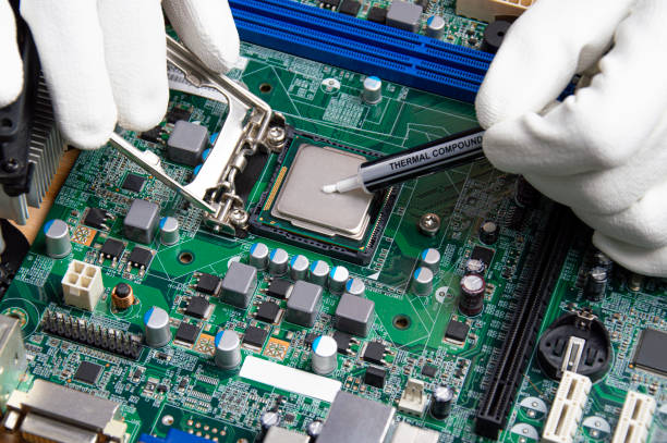 istock he close up image of technician squeezing the fresh thermal paste compound on the top of cpu in the socket. the concept of computer hardware, repairing, upgrade and technology. 2167940698