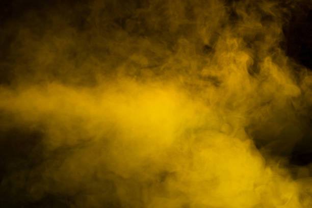 istock Yellow steam on a black background. 2167941071