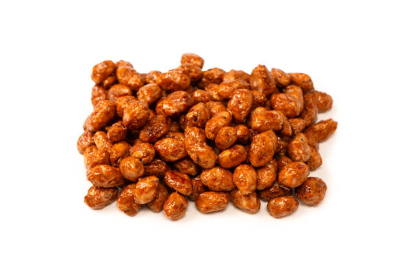 istock Tasty sweet roasted peanuts isolated on a white background. 2167941087