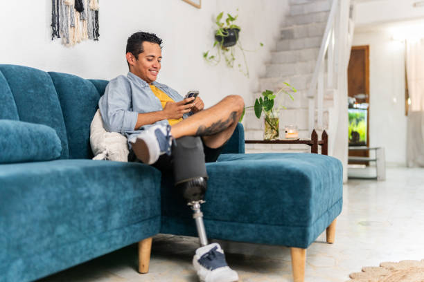istock Mid adult man using mobile phone at home 2167941414