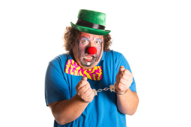 istock Evil clown from horror movies posing on a white background. 2167943973