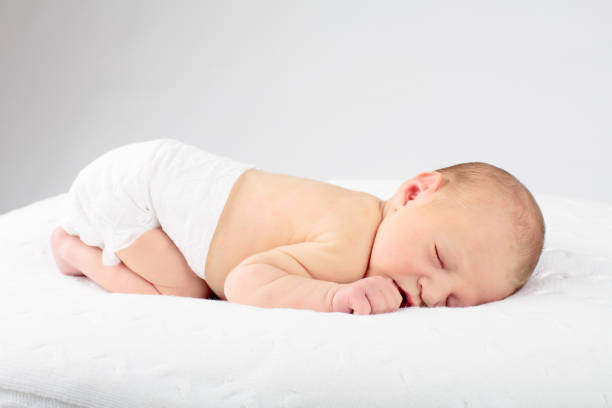 istock Newborn baby boy in hospital cot 2167943974