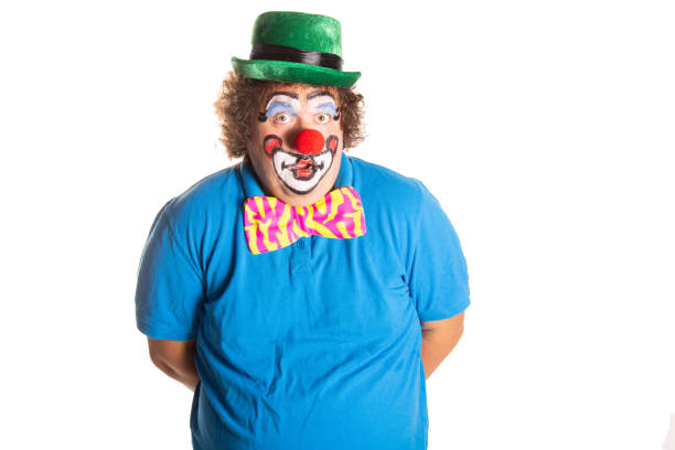 istock Funny fat clown posing on a white background. 2167943987