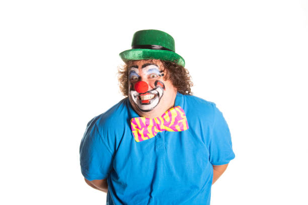 istock Funny fat clown posing on a white background. 2167944043