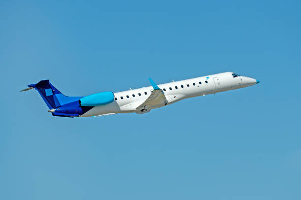 istock regional passenger jet flying in blue sky 2167944067