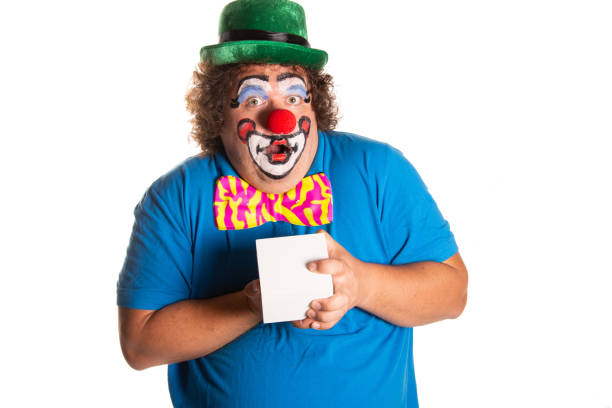istock Funny fat clown posing on a white background. 2167944073