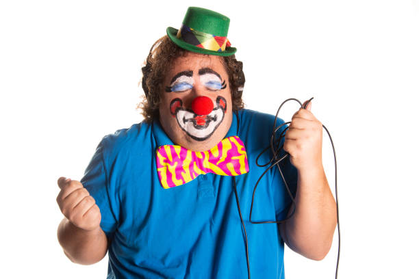 istock Funny fat clown posing on a white background. 2167944143