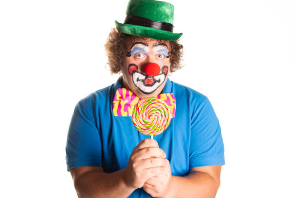 istock Funny fat clown posing on a white background. 2167944157