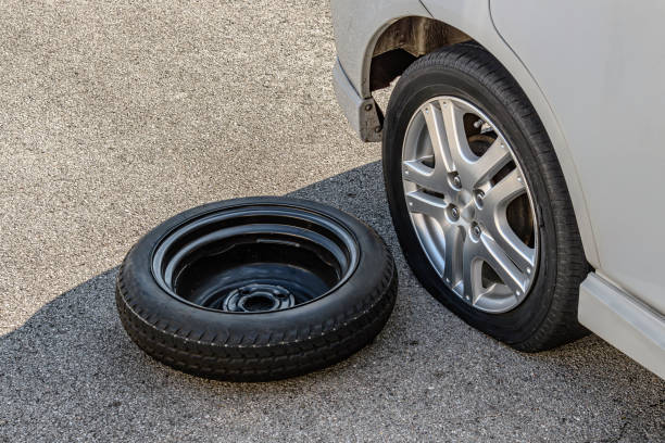 Flat Tire And Donut Spare With Copy Space