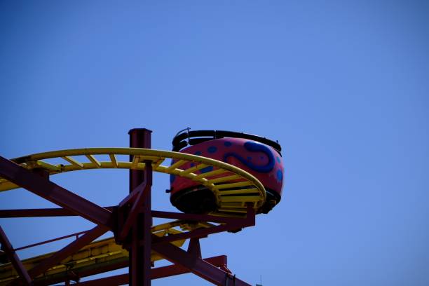 istock Fun Ferris wheel and slides in the amusement park 2167945648