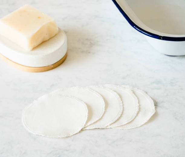 istock Cotton eye pads consecutive display with a soap bar on one side and a bowl on the other side 2167949467