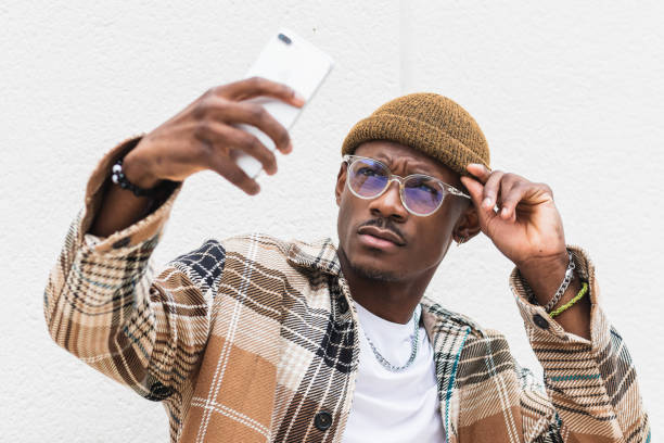 istock Stylish black man taking selfie 2167952120