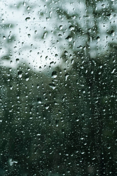 istock Raindrops on window glass. Feeling of lonely, sad, waiting, chill. 2167954777