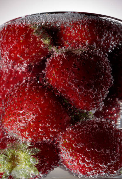 istock strawberries in a glass with champagne 2167957848