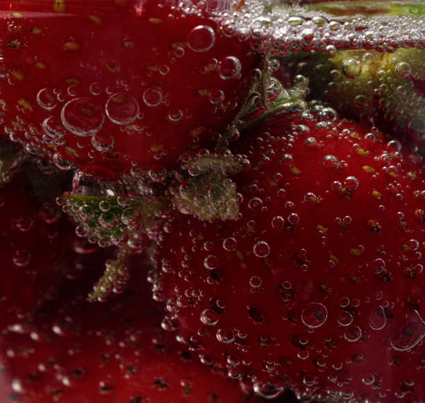 istock strawberries in a glass with champagne 2167957853