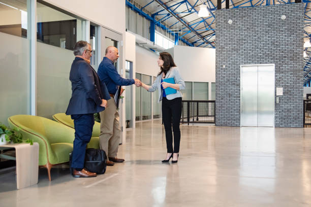 istock Active senior men coming for a job interview in an open work space. 2167959748