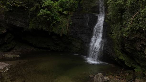 istock little waterfall in the mountain 2167959972