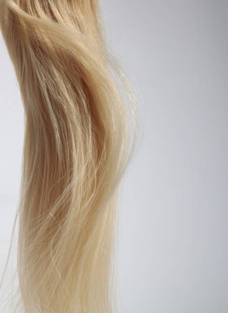 istock blonde hair extensions blowing in the wind 2167962926