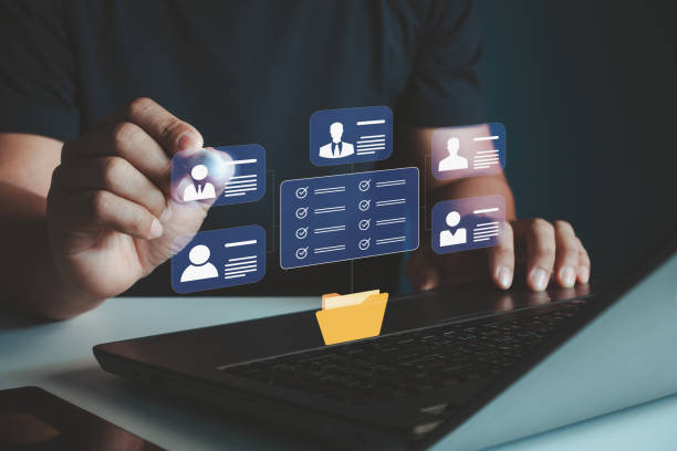 istock HR concept and personal file storage, online personal information management, checklist. Businessman working in HR checklist of employee or job applicant through a virtual screen from laptop computer. 2167964754