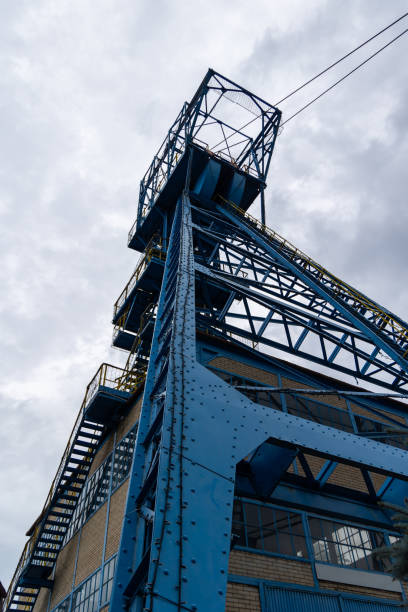 istock Blue coal mine shaft against cloudy sky with dramatic clouds. 2167964855