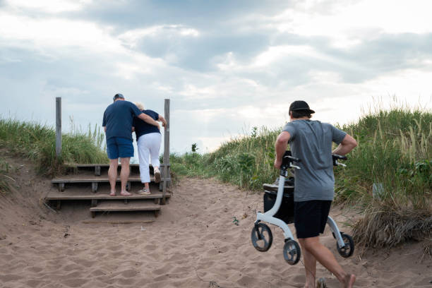 istock Son helps mother up steps at Park Point, Duluth, Minn 2167971105