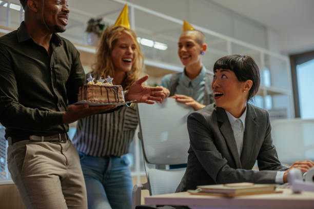 istock Birthday surprise and celebration in the office 2167980426