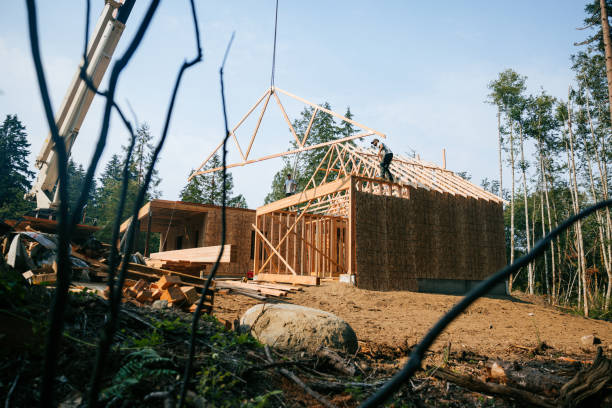 istock Construction Crew Putting Up Framing of New Home 2167986789