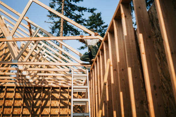 istock Construction Crew Putting Up Framing of New Home 2167986790