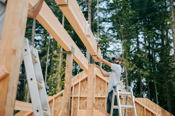 istock Construction Crew Putting Up Framing of New Home 2167986836