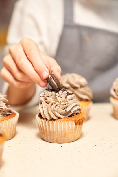 istock Cupcake decorated with cookie by crop chef 2167989590