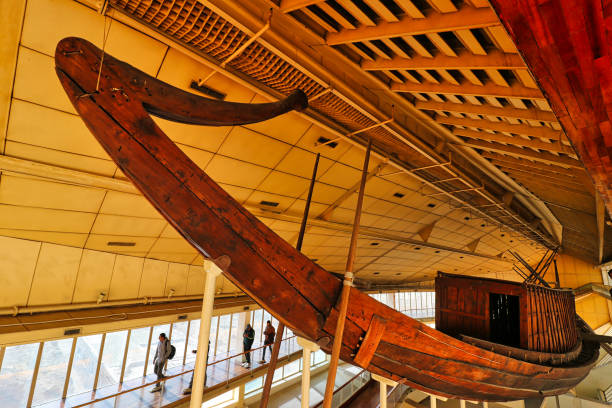 Cairo,Egypt,December 29,2019-Wide angle view of the Great Solar Boat of Khufu at the Solar boat museum near the Pyramid of Khufu,but now moved to the Grand Egyptian Museum near Cairo,Egypt