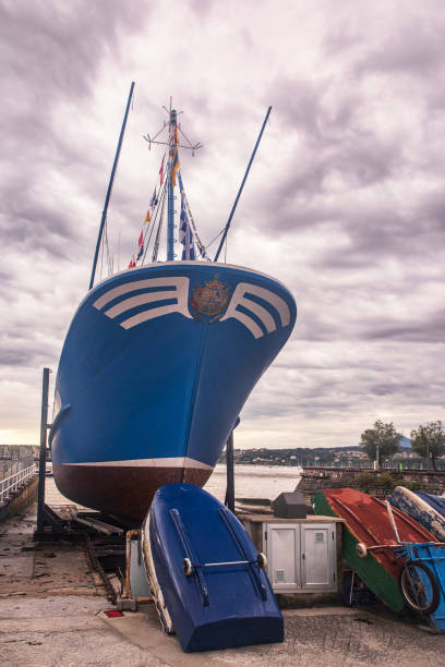 istock Fishing boat at quay 2167991636