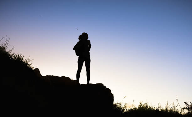 istock Female hiker on the mountain top. 2167991936