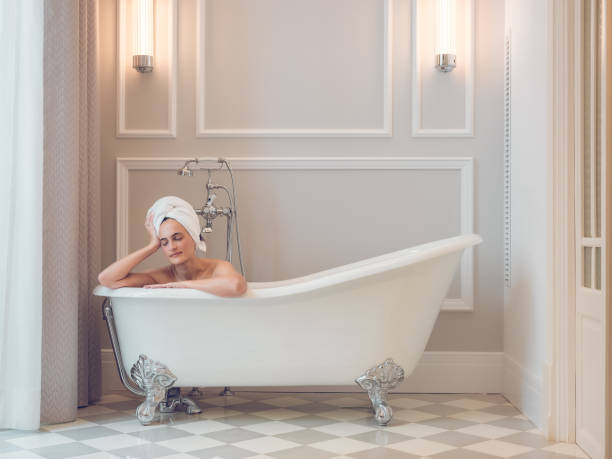 istock Relaxed woman taking bath in bathroom 2167992133