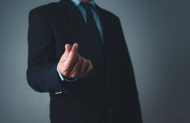 istock Businessman in suit making mini heart hand gesture on grey background 2167995346