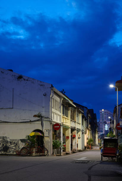 istock Tranquil Evening in George Town: Trishaws Resting in Penangs Heritage Heart. 2167996592
