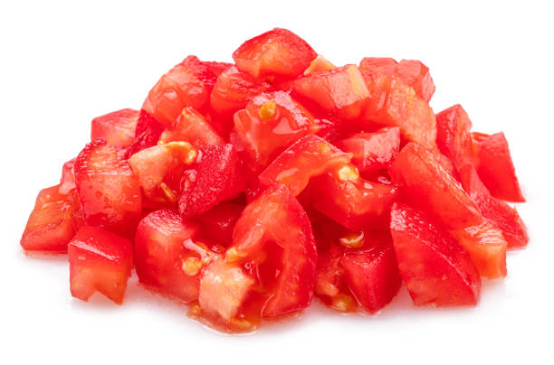 istock Peeled and diced tomatoes isolated on white background. Macro shot. 2168008586