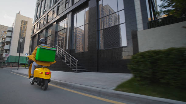 istock Courier man food backpack. Guy ride scooter deliver products. Delivery service. 2168009507