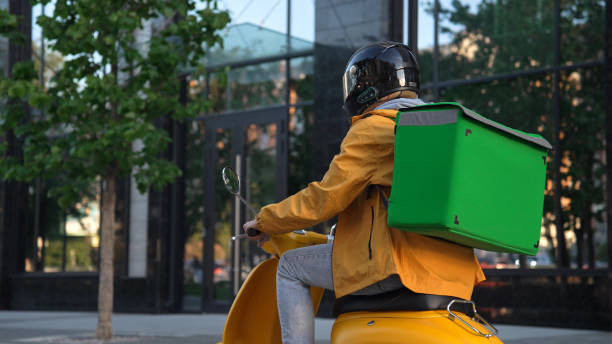 istock Courier man food backpack. Guy ride scooter deliver products. Delivery service. 2168009526