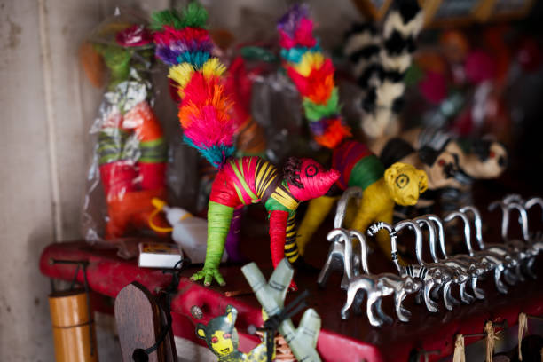 istock Colorful souvenirs from Madagascar featuring handcrafted animal figures and vibrant decorations at a local market stall 2168010838