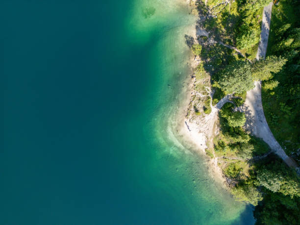 istock Aerial View of Pristine Shoreline with Crystal Clear Water 2168014975