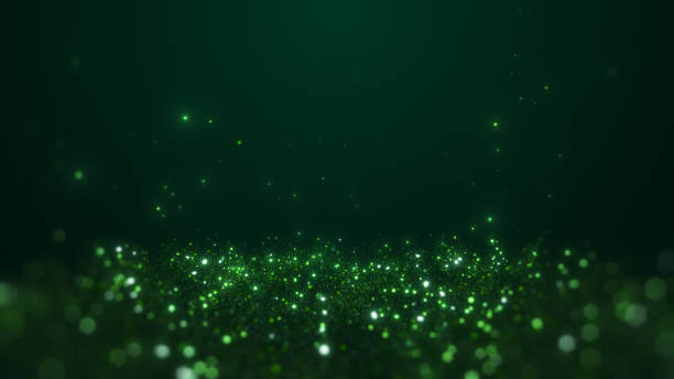 istock A vibrant abstract image featuring a field of glowing green particles against a dark background. 2168020141