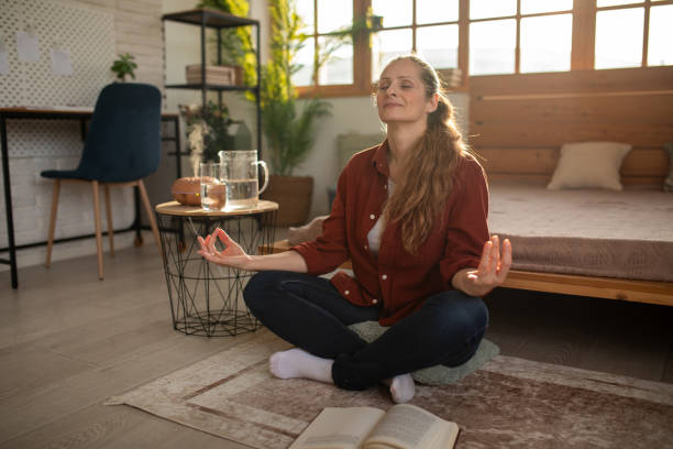 Woman meditating at home