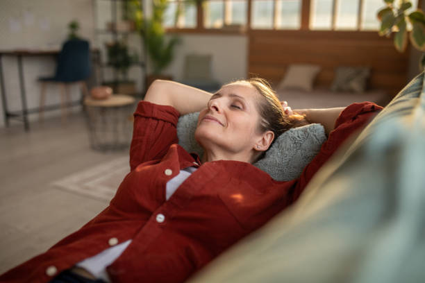 istock Woman relaxing at home 2168020269