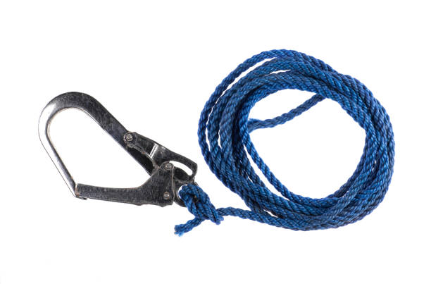 istock Climbing carabiner with blue rope isolated on white background 2168021299