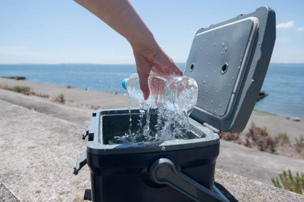 istock take out a cold drink from the cooler box 2168028678
