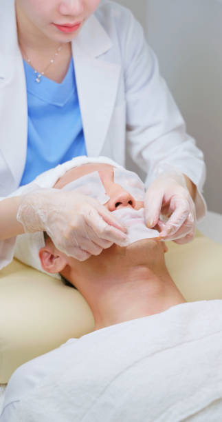 istock asian beautician help face cleaning 2168030337