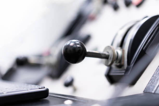 istock Close-up of a lever on an electronic control panel. Selective focus. Blurred light background 2168031563
