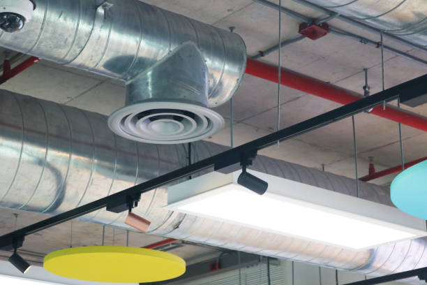 istock Galvanized iron air conditioning duct shape round installed on building ceiling. 2168041948