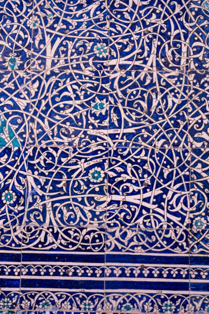 istock The blue and white tile pattern on the wall is ornate and intricate. The design features flowers and leaves, giving the impression of a natural and organic feel 2168042474